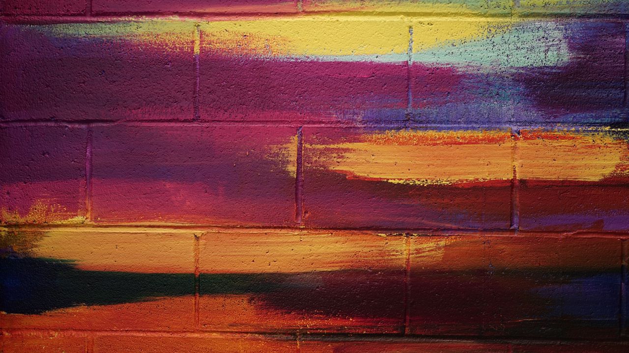 Wallpaper brick wall, paint, multi-colored