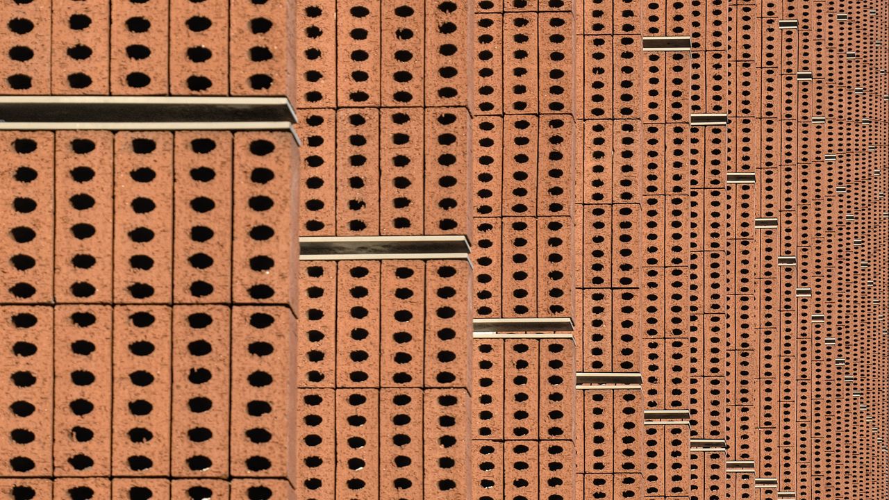 Wallpaper bricks, holes, relief