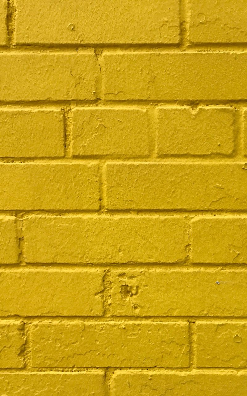 800x1280 Wallpaper bricks, yellow, wall, texture