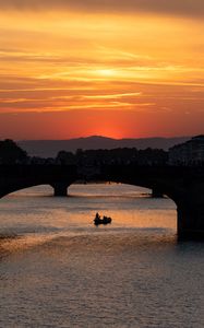 Preview wallpaper bridge, arch, boat, silhouette, sea, sunset