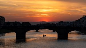 Preview wallpaper bridge, arch, boat, silhouette, sea, sunset