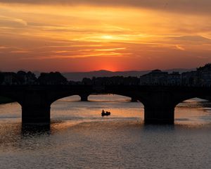 Preview wallpaper bridge, arch, boat, silhouette, sea, sunset