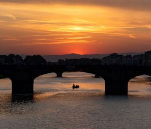 Preview wallpaper bridge, arch, boat, silhouette, sea, sunset