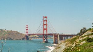 Preview wallpaper bridge, architecture, rocks, sea, bushes