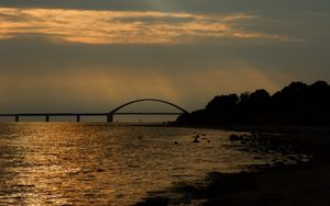 Preview wallpaper bridge, beach, coast, sunset, dark