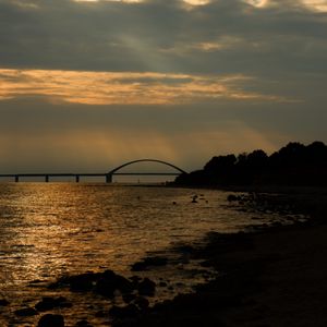 Preview wallpaper bridge, beach, coast, sunset, dark