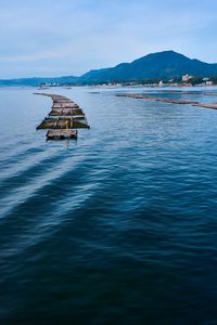 Preview wallpaper bridge, boards, sea, mountains