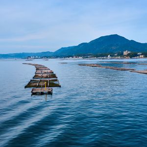 Preview wallpaper bridge, boards, sea, mountains