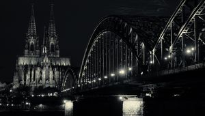 Preview wallpaper bridge, building, lights, tower, night, black and white