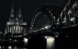 Preview wallpaper bridge, building, lights, tower, night, black and white