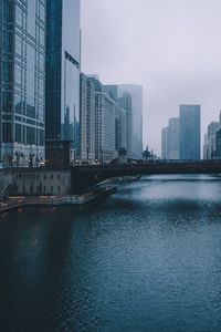 Preview wallpaper bridge, building, skyscrapers, river