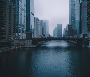 Preview wallpaper bridge, building, skyscrapers, river