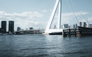 Preview wallpaper bridge, buildings, architecture, city, coast, water