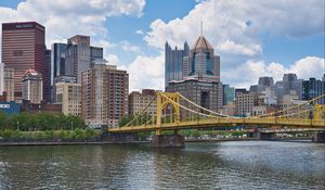 Preview wallpaper bridge, buildings, architecture, river, city, clouds