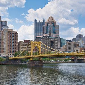 Preview wallpaper bridge, buildings, architecture, river, city, clouds