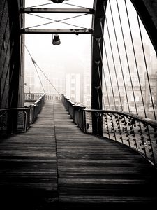 Preview wallpaper bridge, buildings, fog, black and white