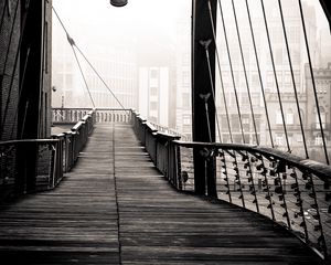 Preview wallpaper bridge, buildings, fog, black and white