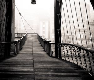 Preview wallpaper bridge, buildings, fog, black and white