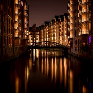 Preview wallpaper bridge, buildings, lights, night, water, reflection