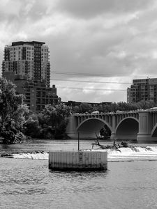 Preview wallpaper bridge, buildings, river, black and white