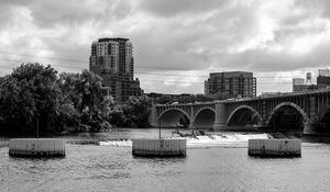 Preview wallpaper bridge, buildings, river, black and white