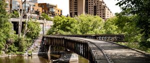 Preview wallpaper bridge, buildings, trees, river