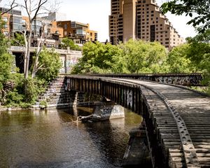 Preview wallpaper bridge, buildings, trees, river