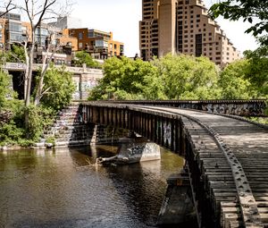 Preview wallpaper bridge, buildings, trees, river