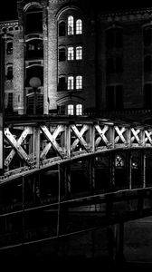 Preview wallpaper bridge, buildings, windows, light, night, black and white