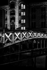 Preview wallpaper bridge, buildings, windows, light, night, black and white
