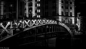 Preview wallpaper bridge, buildings, windows, light, night, black and white