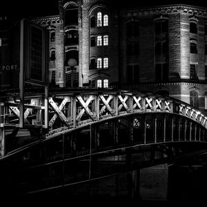 Preview wallpaper bridge, buildings, windows, light, night, black and white