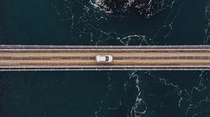 Preview wallpaper bridge, car, aerial view, water, rocks