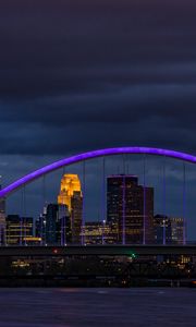 Preview wallpaper bridge, city, architecture, buildings, river, arch, clouds