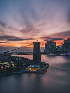 Preview wallpaper bridge, city, architecture, water, sunset