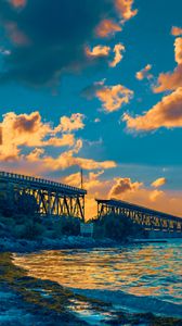 Preview wallpaper bridge, clouds, water, sunset, nature, landscape