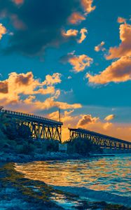 Preview wallpaper bridge, clouds, water, sunset, nature, landscape
