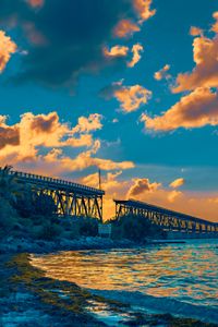 Preview wallpaper bridge, clouds, water, sunset, nature, landscape