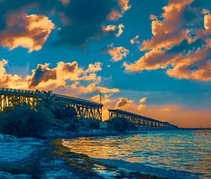 Preview wallpaper bridge, clouds, water, sunset, nature, landscape