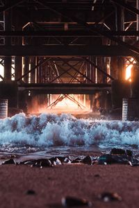 Preview wallpaper bridge, construction, sea, stones