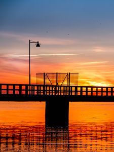 Preview wallpaper bridge, construction, water, sunset, dark