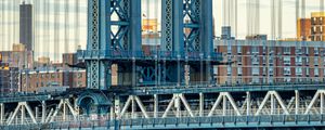Preview wallpaper bridge, crossbars, cables, city, buildings, architecture