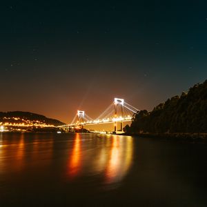 Preview wallpaper bridge, glow, sea, night, lights