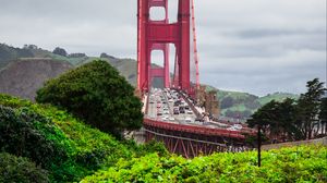 Preview wallpaper bridge, hills, bushes, cars