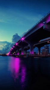 Preview wallpaper bridge, lights, evening, skyscrapers, river