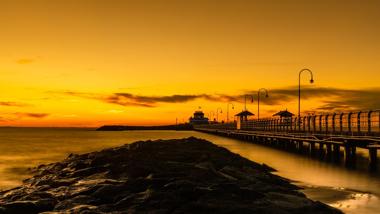 Wallpaper bridge, lights, rocks, sunset