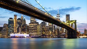 Preview wallpaper bridge, lights, skyscrapers, city, twilight