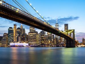 Preview wallpaper bridge, lights, skyscrapers, city, twilight