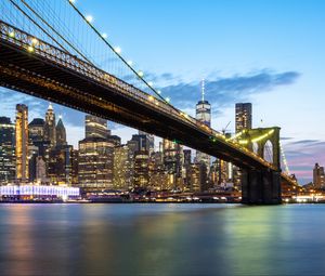 Preview wallpaper bridge, lights, skyscrapers, city, twilight