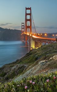 Preview wallpaper bridge, lights, slope, sea, strait